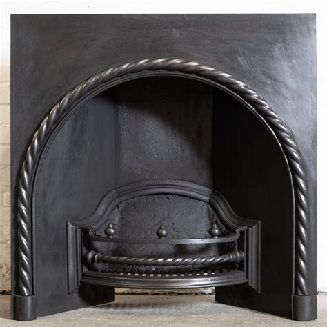 old metal fireproof cast iron box|cast iron arched fireplace insert.